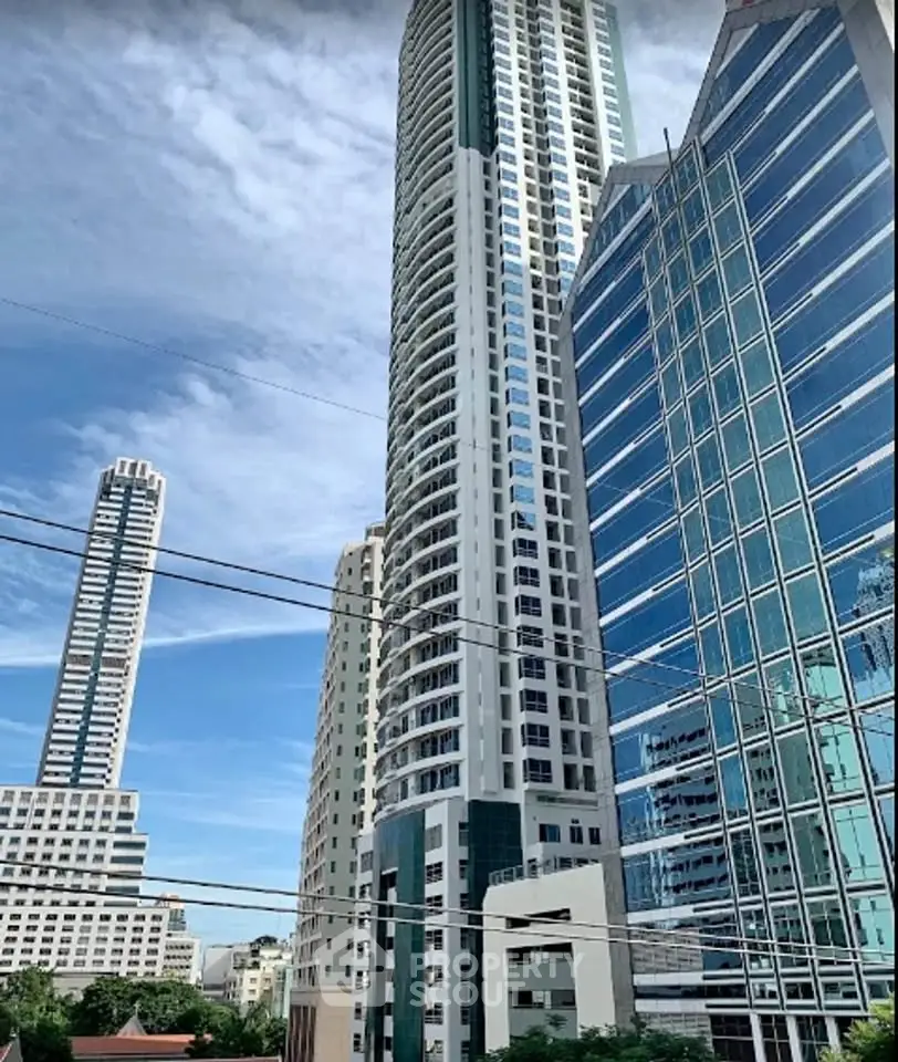 Stunning high-rise buildings with modern architecture and blue sky backdrop.