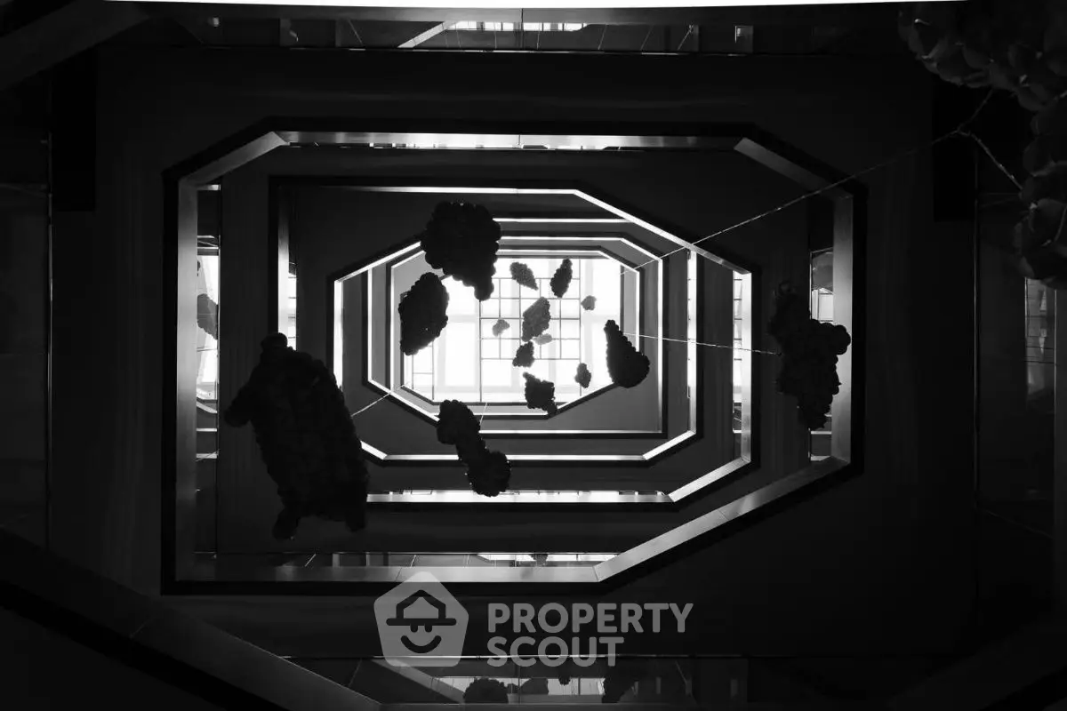 Stunning architectural view of a modern building's interior atrium with geometric design.