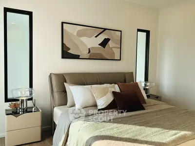 Luxurious bedroom with modern decor and stylish lighting, perfect for relaxation and comfort.