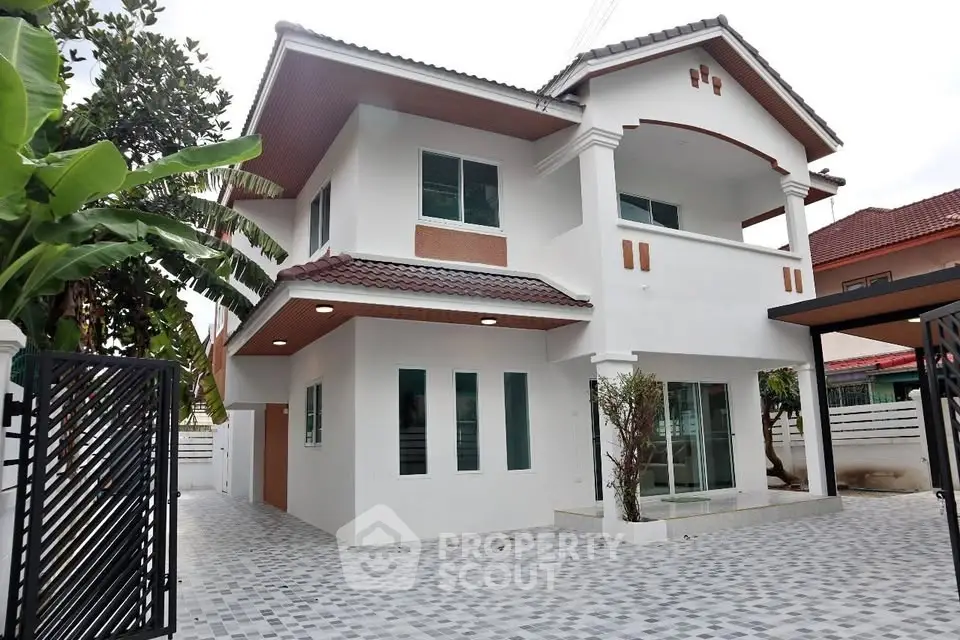 Stunning two-story house with modern design and spacious driveway