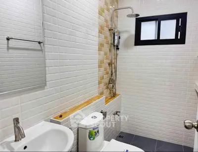 Modern bathroom with sleek fixtures and stylish tile design