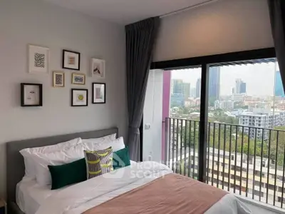 Modern bedroom with city view and stylish decor in urban apartment