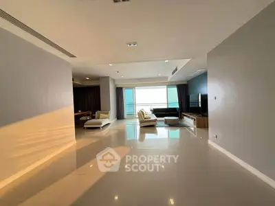 Spacious modern living room with sleek design and natural light