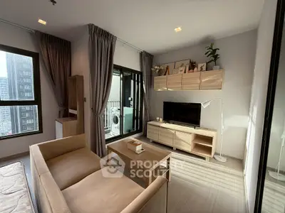 Modern living room with balcony view, stylish furniture, and natural light.