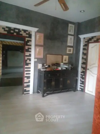 Chic interior with stylish decor and modern flooring in a cozy home setting.