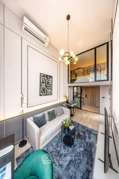 Modern loft-style living room with high ceilings and stylish decor