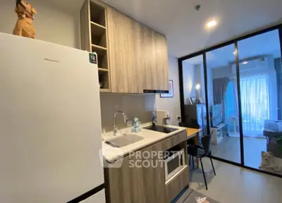 Modern kitchen with sleek design and open layout in stylish apartment