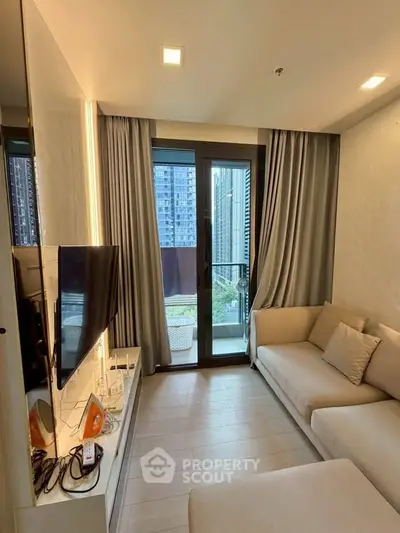 Modern living room with large window and city view, featuring cozy sofa and wall-mounted TV.