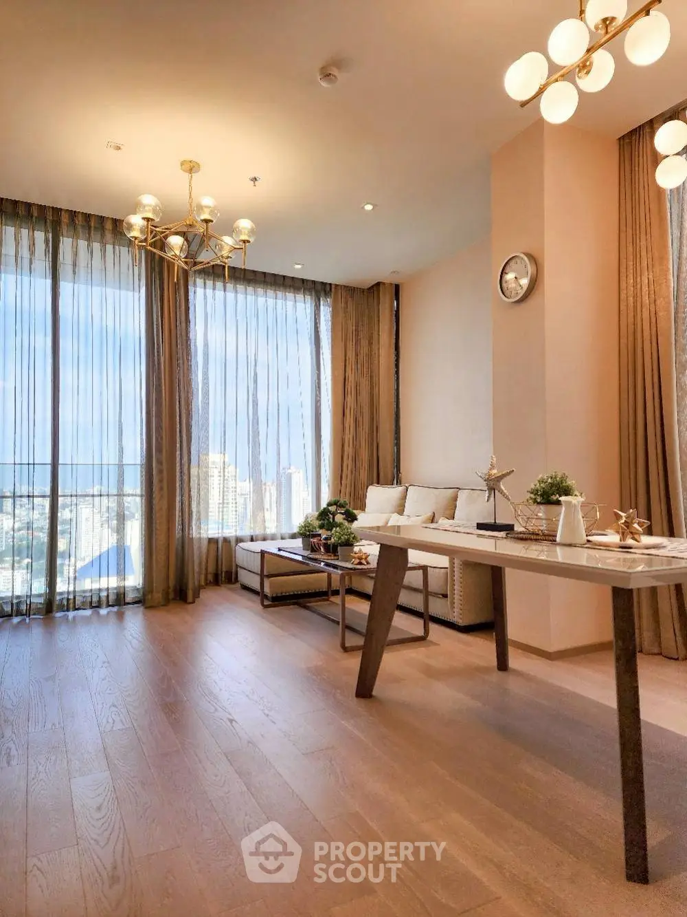 Luxurious living room with floor-to-ceiling windows and elegant decor