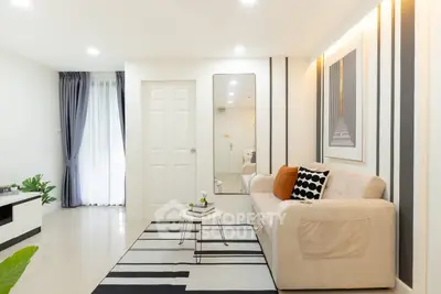 Modern living room with stylish decor and natural light