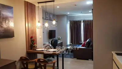 Modern living room with stylish decor and cozy seating area, perfect for relaxation and entertainment.