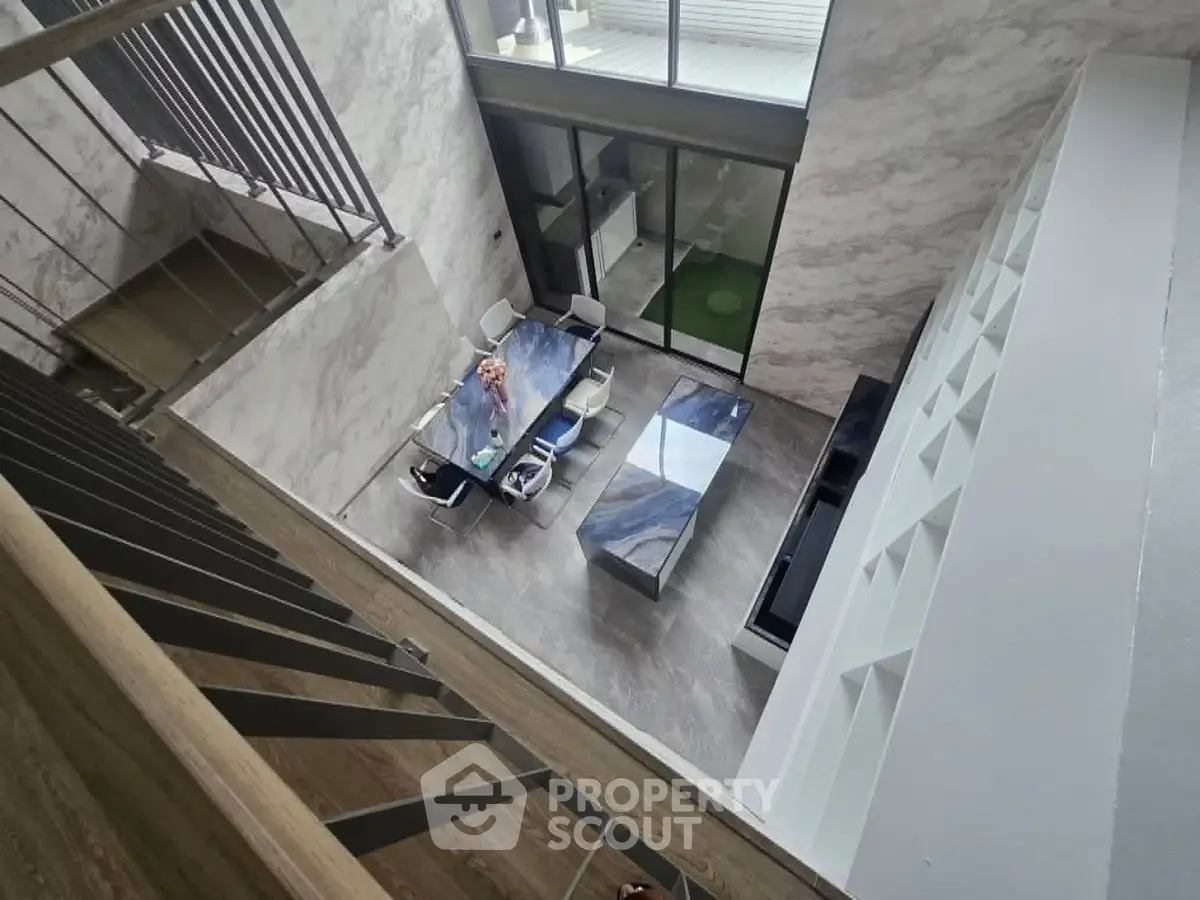 Stunning modern interior with open layout and elegant staircase, perfect for contemporary living.