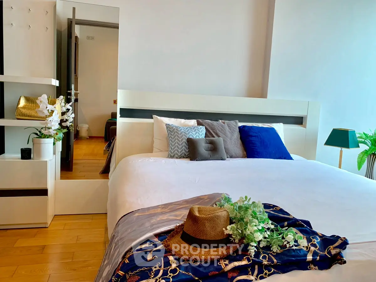 Luxurious bedroom with stylish decor and cozy ambiance, perfect for relaxation and comfort.