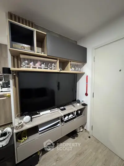 Modern living room with sleek TV unit and stylish shelving
