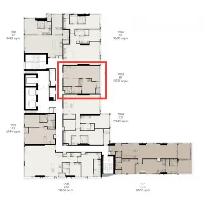 Detailed floor plan of a modern apartment complex with highlighted unit.