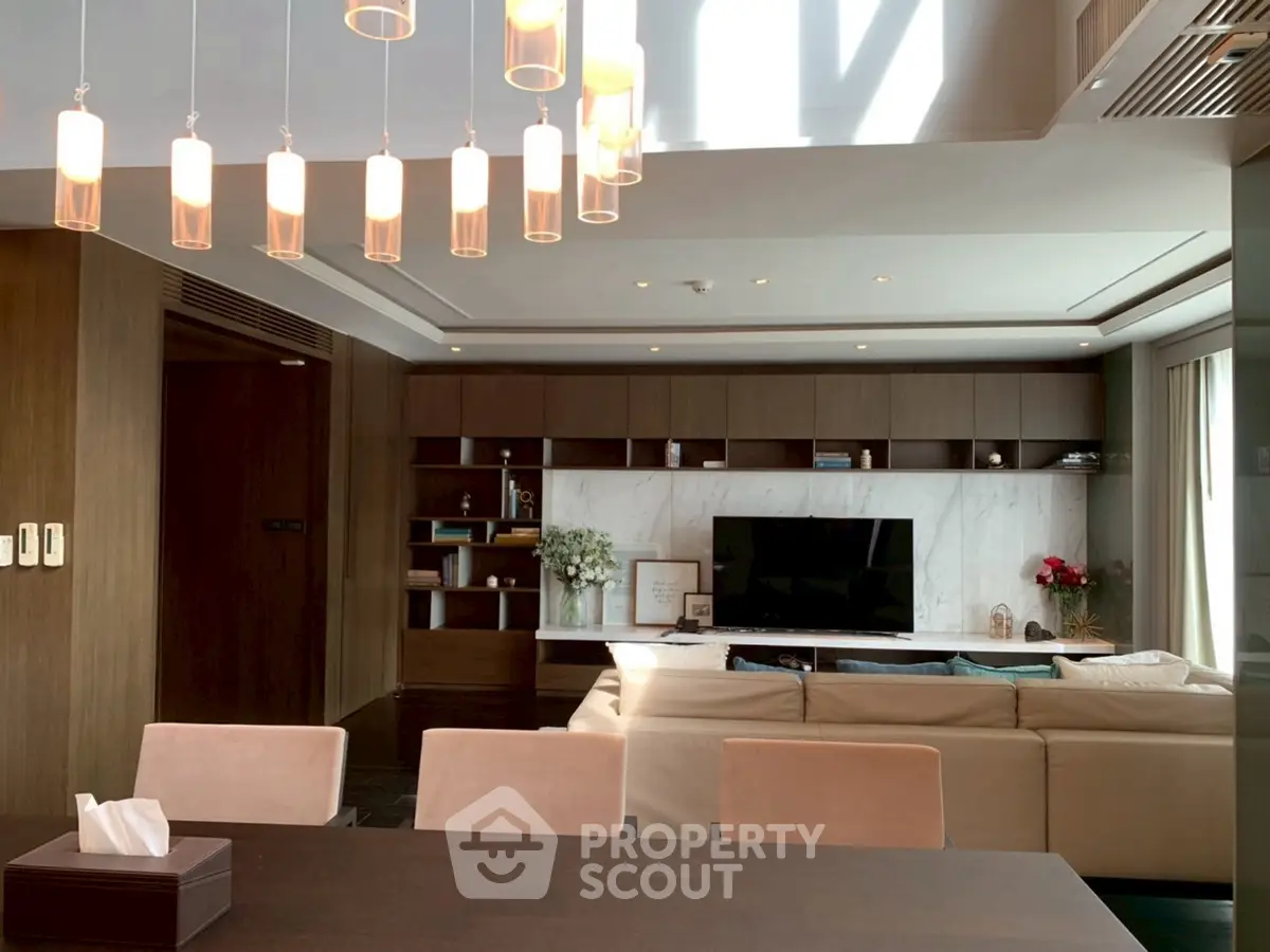 Luxurious modern living room with elegant lighting and stylish decor