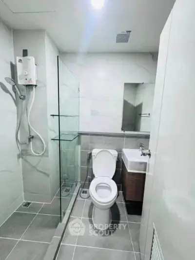 Modern bathroom with sleek design and glass shower enclosure