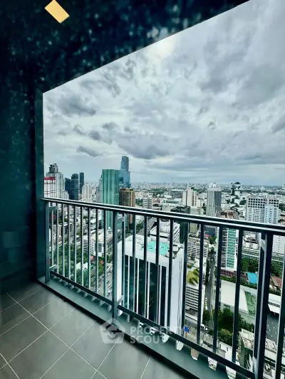 Stunning cityscape view from a high-rise balcony, perfect for urban living enthusiasts.