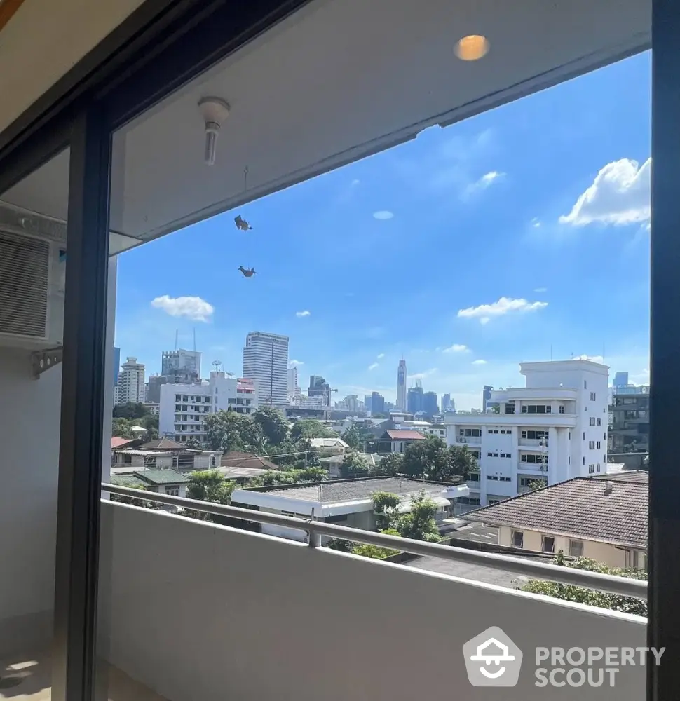 Stunning city view from a modern balcony, perfect for urban living.