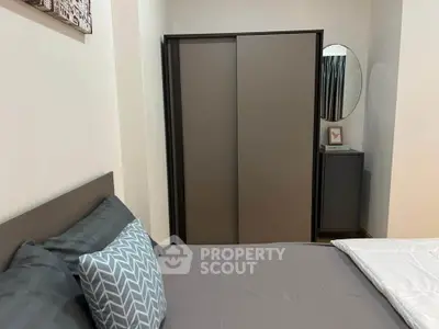 Modern bedroom with sleek wardrobe and stylish decor