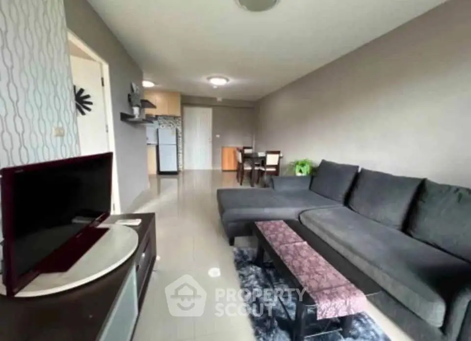 Spacious modern living room with sleek furniture and open layout