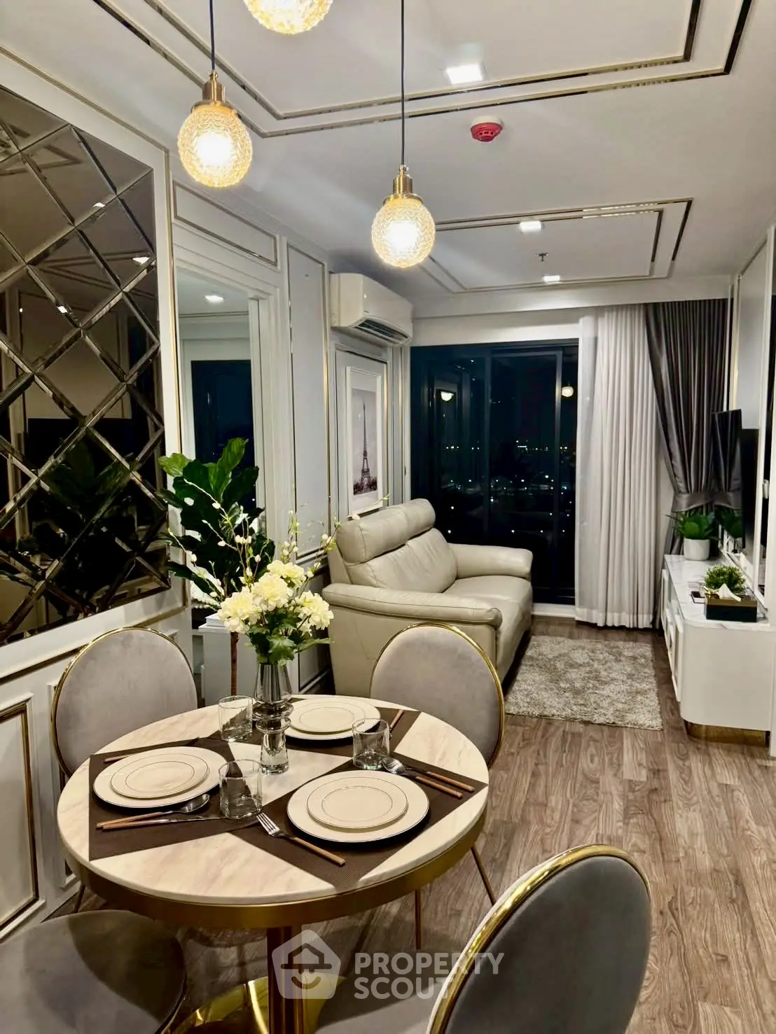 Luxurious modern living room with elegant decor and city view, perfect for urban living.