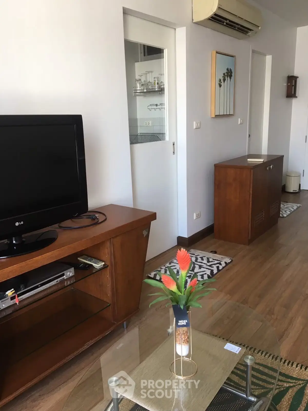 Cozy living room with wooden furniture and modern decor