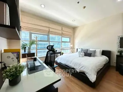 Modern bedroom with large windows and stylish decor in urban apartment