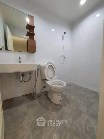 Modern bathroom with sleek design and shower area
