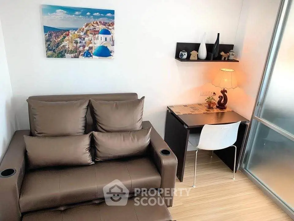 Modern living room with sleek brown sofa and stylish desk setup