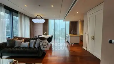Luxurious modern living room with elegant dining area and city view, featuring hardwood floors and stylish lighting.