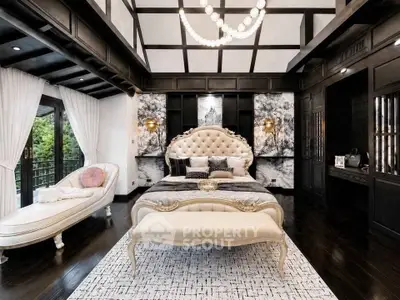Luxurious bedroom with elegant decor and plush furnishings in a sophisticated setting.
