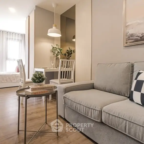 Stylish modern living room with cozy sofa and elegant decor in a bright apartment.