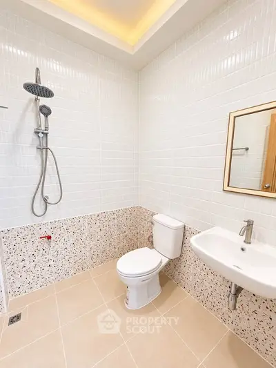 Modern bathroom with sleek fixtures and elegant tile design