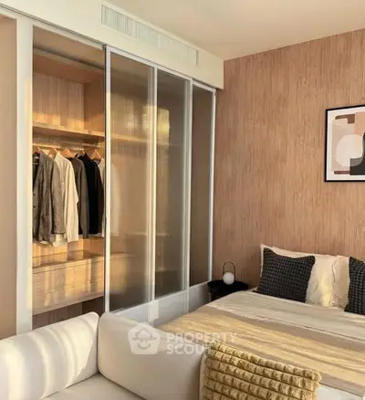 Modern bedroom with sliding closet doors and cozy decor