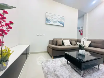Modern living room with sleek furniture and stylish decor