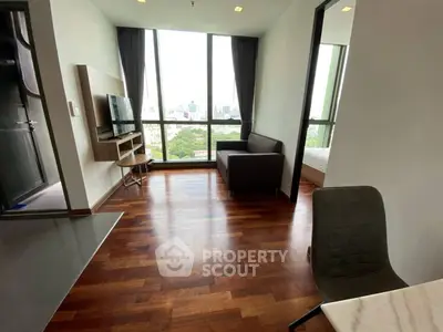 Modern living room with city view and hardwood floors