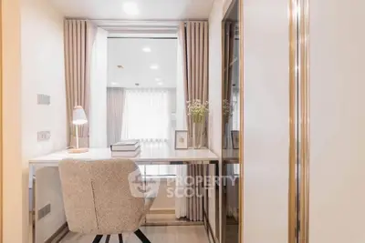 Elegant study room with modern desk and cozy chair, perfect for productivity and comfort.