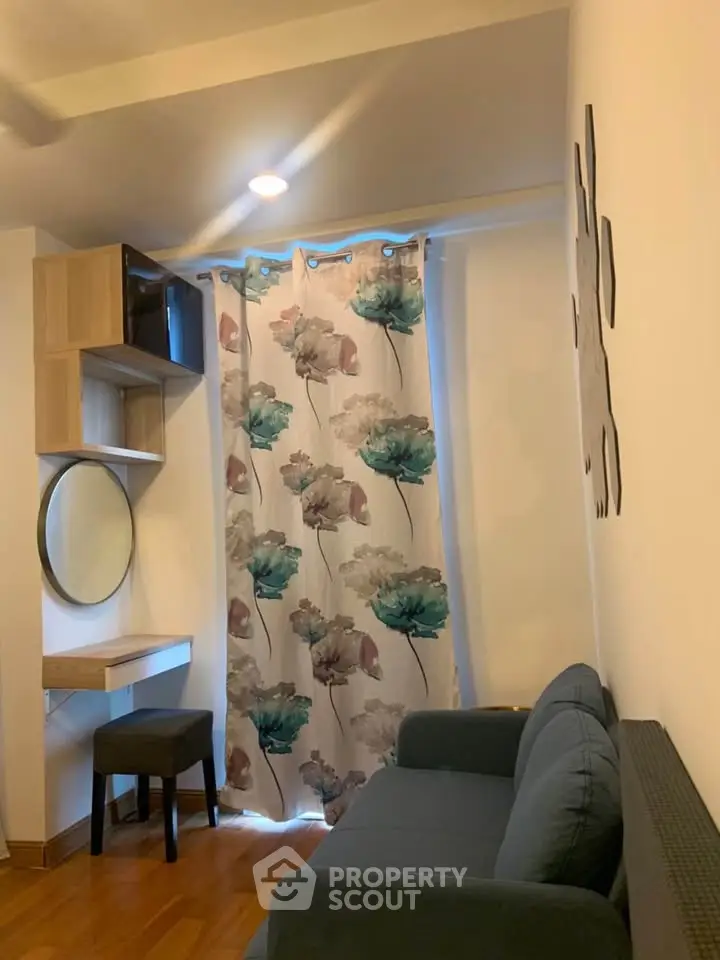 Cozy living room with floral curtains and modern decor