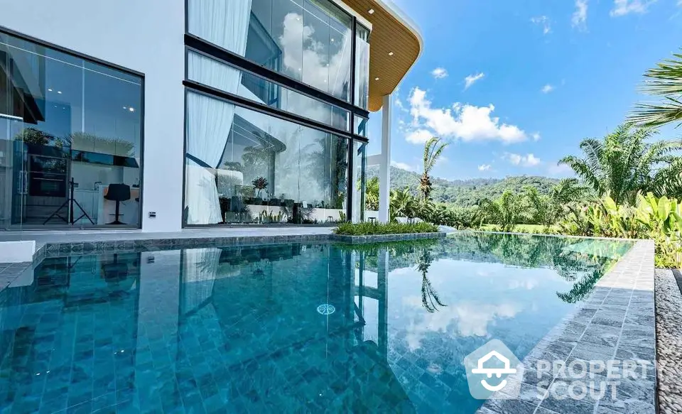 Luxurious modern villa with stunning pool and panoramic mountain views