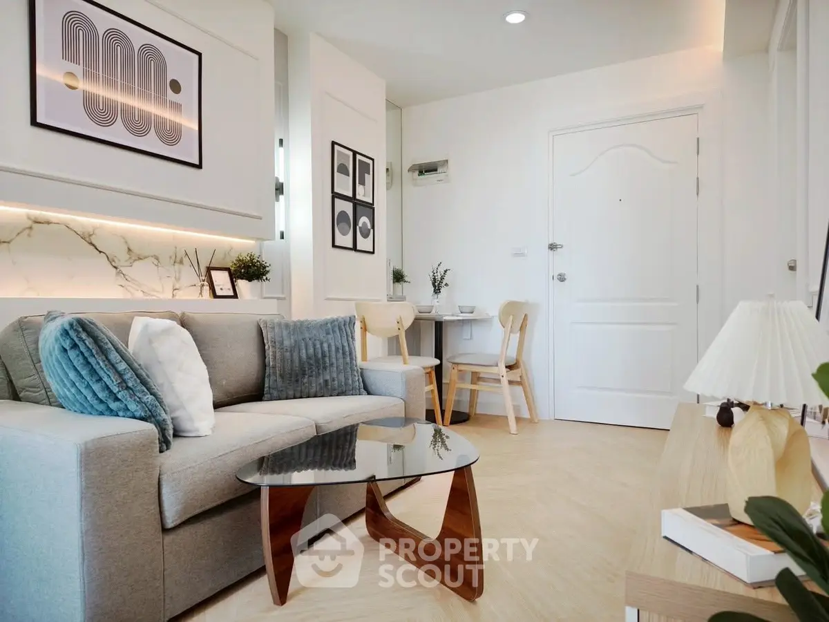 Modern living room with stylish decor and cozy seating area