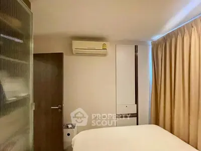 Cozy bedroom with air conditioning and modern decor