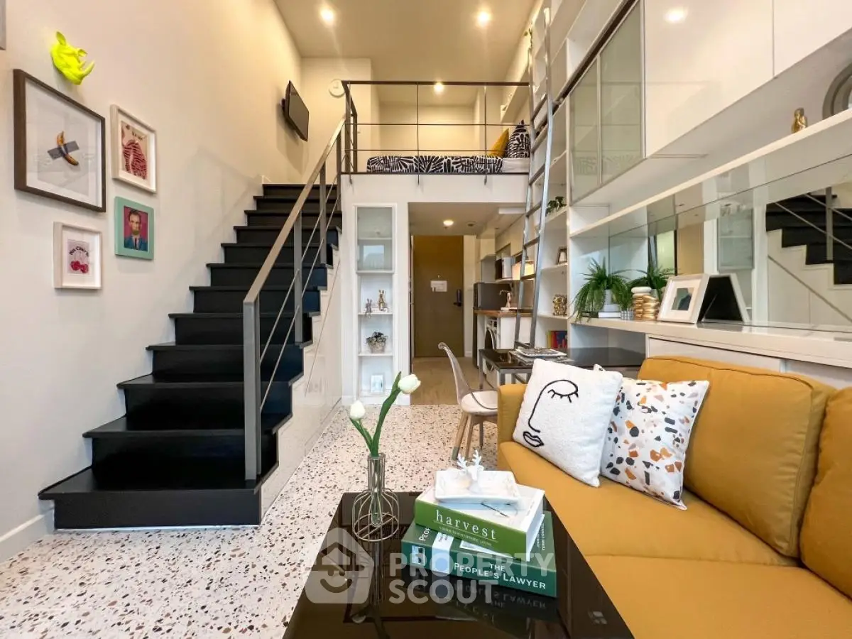 Modern loft-style living room with mezzanine and stylish decor