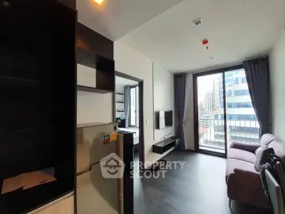 Modern living room with balcony view in urban apartment