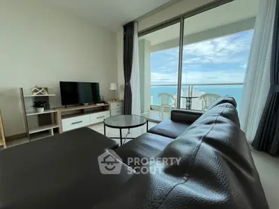 Luxurious living room with stunning ocean view and modern furnishings