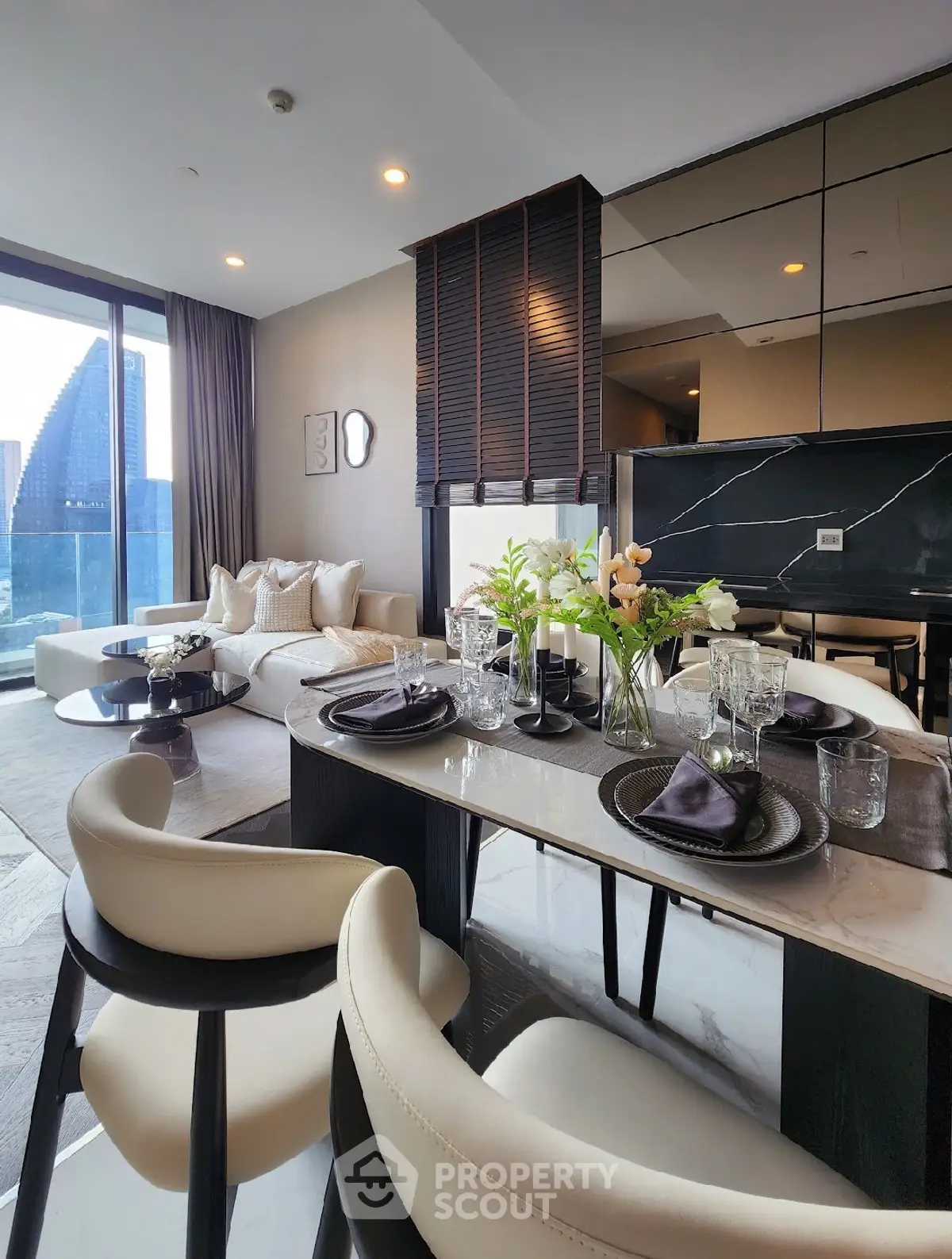 Luxurious modern living room with elegant dining area and stunning city view
