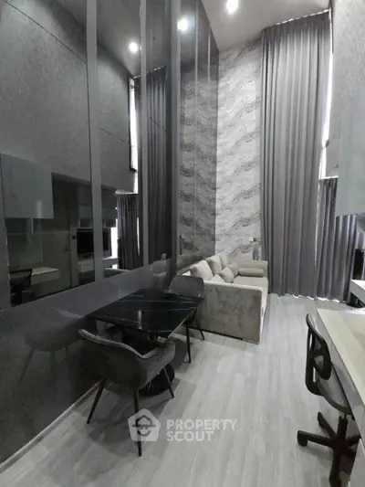 Modern living room with high ceilings and stylish decor