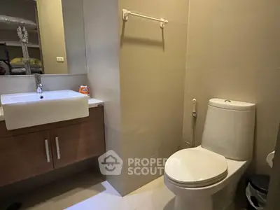 Modern bathroom with sleek fixtures and ample storage space