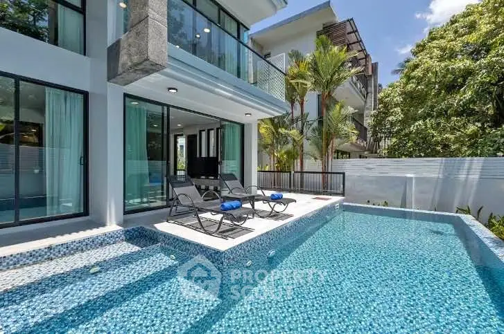 Luxurious modern villa with private pool and spacious balcony, perfect for relaxation and entertaining.