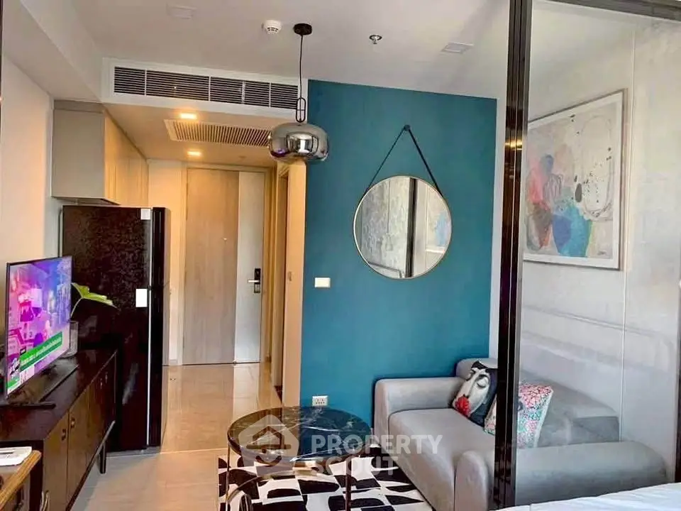 Modern living room with stylish decor and open layout in a contemporary apartment.